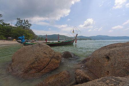 上岸船只运输海岸线自然岩石木材海景天空旅行照片图片