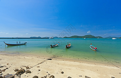 近岸船只自然岩石海景海岸线热带运输天空旅行照片木材图片