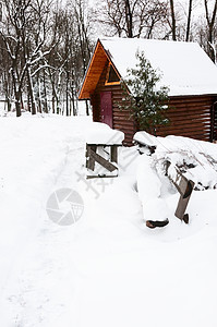 雪冬公园中的木屋图片