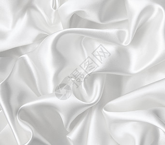 作为婚礼背景的平滑优雅白色丝绸纺织品布料织物曲线涟漪折痕材料海浪银色投标图片