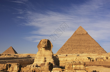 卡弗尔的斯芬克斯和金字塔 埃及开罗骆驼雕像雕塑考古学大篷车异位素石头风暴风景地标图片