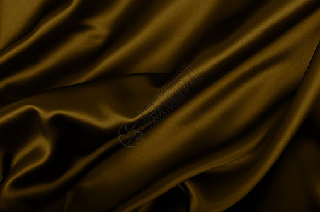 丝绸背景金子布料奢华纺织品波浪状材料窗帘海浪衣服涟漪图片