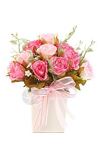 白色的花瓶中的粉红玫瑰背景图片