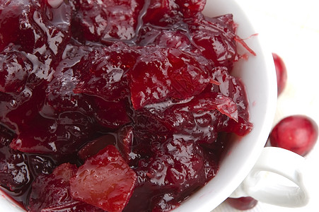 蔓越莓水果蔓越莓果酱木板红色甜点盘子烹饪生产食物水果浆果背景