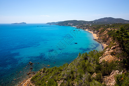 海滩 圣尤拉利亚岩石海岸地标运河旅游油菜花支撑海洋旅行天空图片