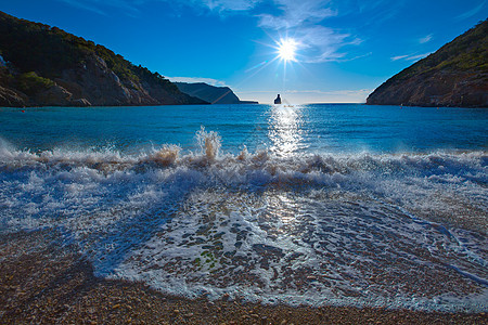巴利阿里奇岛圣胡安市日落海滩支撑海岸海景日落石头波浪海滩假期旅行太阳图片