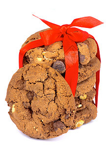 圣诞饼干坚果红带美食家庆典饮食红色甜点甜食丝带食物图片