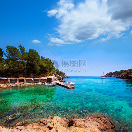 圣尤拉利亚的海滩油菜花海洋岩石旅行蓝色旅游支撑码头海景图片