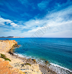 在巴利阿里奇的圣何塞南部海滩海洋旅行小岛天空海岸天堂波浪晴天石头假期图片