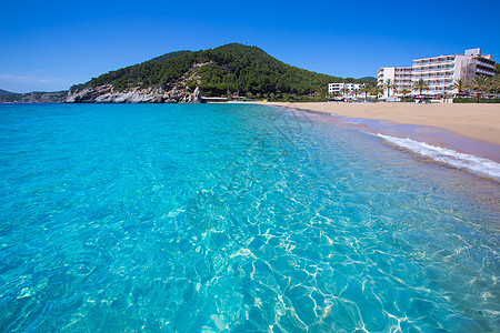 巴利阿里群岛的海滩圣胡安岛旅游建筑物天空蓝色旅行地标海洋树木天堂悬崖图片