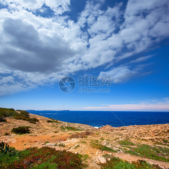 视图中的伊比萨萨托雷场景旅行蓝色假期支撑海滩石头晴天太阳海岸图片