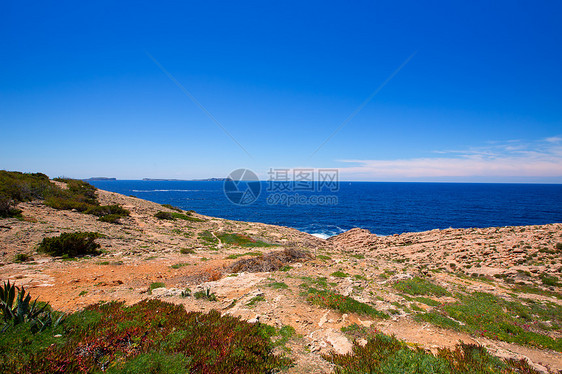 视图中的伊比萨萨托雷太阳海滩海岸天堂假期海洋波浪小岛天空旅行图片