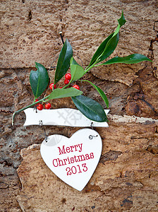 圣诞节的 Rustic 背景白色丝带礼物时候心形树叶乡村框架树枝红色图片