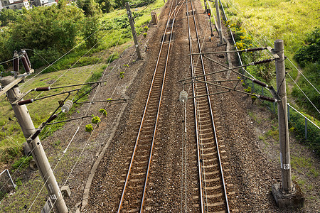 铁路运输小路轨道绿色场地草地旅行岩石过境火车图片