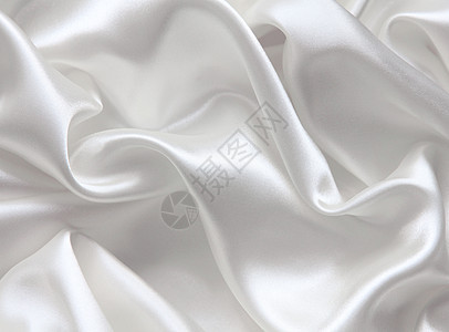 作为婚礼背景的平滑优雅白色丝绸新娘布料涟漪银色材料曲线投标海浪折痕织物图片