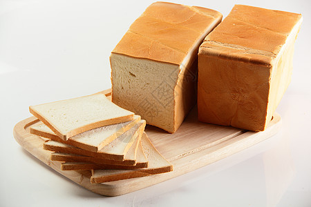 白背景的美味面包黄色食物粮食早餐乡村饮食面粉脆皮小麦白色图片