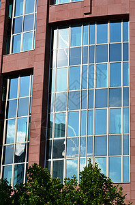现代办公大楼玻璃面罩蓝色房子办公室建筑天空商业反射图片