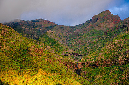 C区Masca村附近Tenerife西北山区日落射线建筑顶峰建筑学宽慰风景阳光棕榈植被房子图片