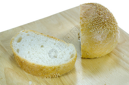 面包上的食物面粉圆圈芝麻种子圆形糕点棕色小麦营养粮食图片