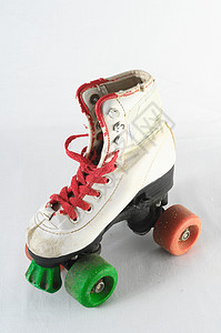 消耗的滚式滑板滑冰孩子旱冰皮革轮子溜冰者古董靴子车轮鞋带图片