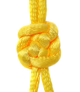 黄色丝带的结子码头蕾丝指导力量游艇细绳宏观花边绳索电缆图片