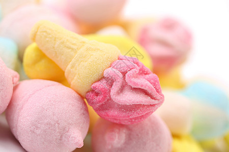 冰淇淋形式的棉花糖水果童年糖果小吃垃圾孩子食物白色团体黄色图片