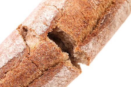 断断的长长面包生活棕色面粉谷物早餐糖类美食食物白色包子图片