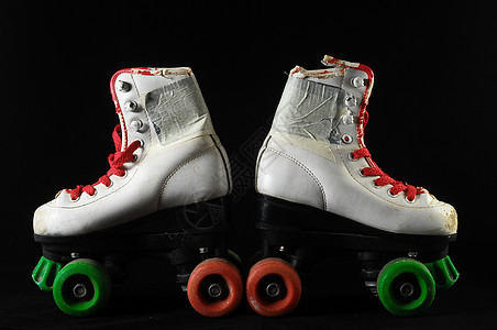 消耗的滚式滑板乐趣蕾丝孩子轮子鞋带闲暇溜冰者娱乐皮革运动图片