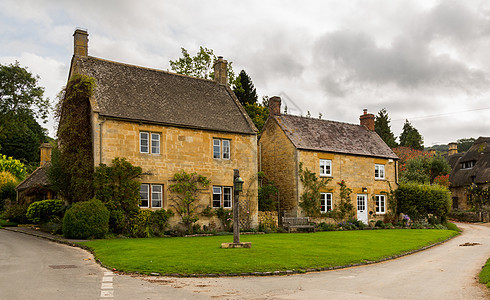 英格兰Cotswold区老房子戏剧性房子建筑街道石头广场小屋城镇历史性农村图片