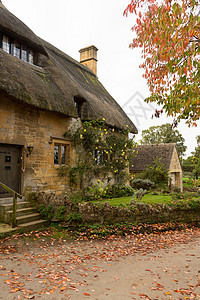 英格兰Cotswold区老房子房子花园围墙戏剧性石头房屋小屋建筑学玫瑰历史性图片