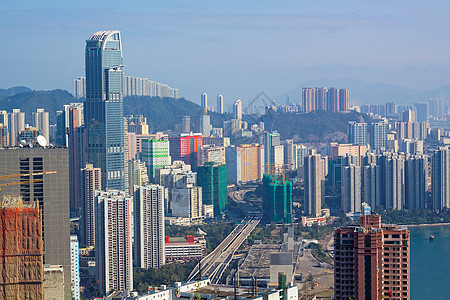 中湾市中心九龙香港的景象天际景观辉光街道交通紫色城市生活地平线建筑物城市图片