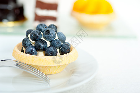 蓝莓奶油蛋糕鞭打营养水果蛋糕静物奶油小吃蛋糕奶油状糕点浆果图片