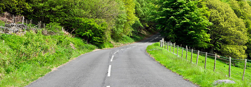 农村公路英语全景旅行栅栏丘陵风景中心滚动绿色分频器图片