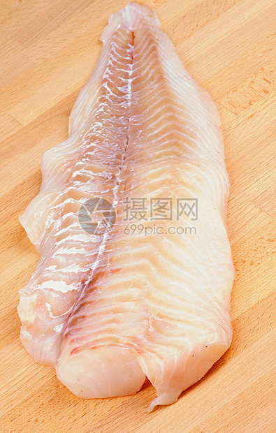 原鳕鱼褐色生食健康饮食白色砧板饮食粉色木头食物白鱼图片