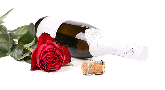 红玫瑰和一瓶香槟液体工作室气泡玫瑰绿色金子花瓣火花长笛酒杯图片