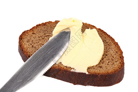棕色面包和黄油奶制品食物烹饪白色产品早餐脆皮宏观小吃图片