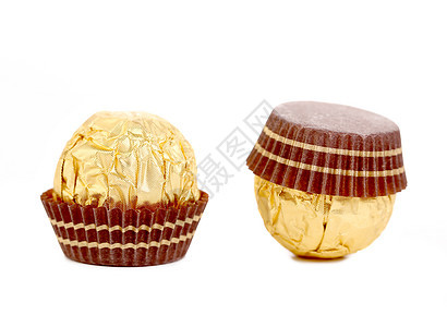 金巧克力甜点贴近了糕点甜品食物糖果白色巧克力金子飞碟松露图片