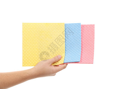 手握着不同的海绵清洁工粉色正方形抹布清洁洗澡蓝色工作地面家务图片