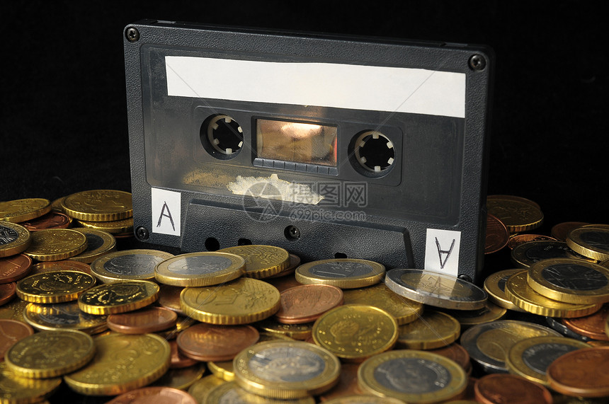 金钱和音乐概念金融财富现金药品符号交换经济磁盘磁带贮存图片