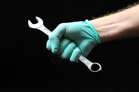 一个钥匙栓和一个手工人工业黑色金属乐器维修扳手锤子螺栓钥匙图片