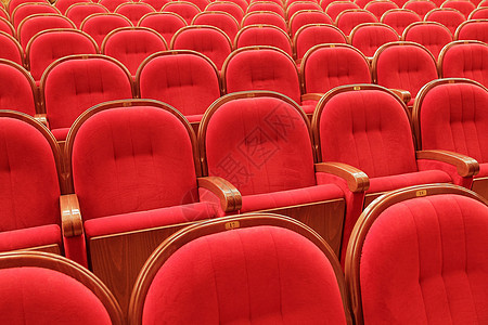 红戏剧红椅的背景背景Name天鹅绒剧院扶手红色艺术窗帘礼堂歌剧座位装饰品图片