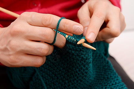 妇女用羊毛编织的缝合衣物图片