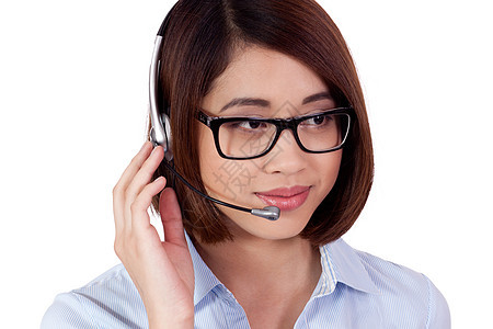 年轻笑笑的女商务人士称中心代理员孤立蓝色工作快乐技术顾客操作员耳机商务热线服务图片