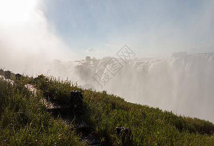 赞比西河上的维多利亚瀑布公园彩虹急流旅游森林流动薄雾地标风景航班图片