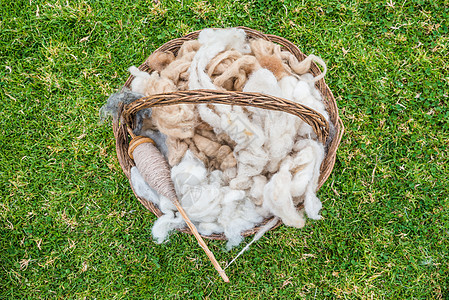 安第斯秘鲁Cuzco 秘鲁地方纺织品羊毛羊驼染料篮子骆驼地标手工服饰图片