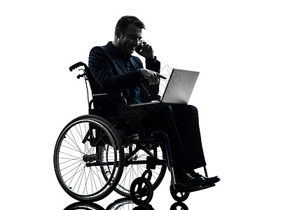 残疾人企业用手轮车电脑计算笔记本电脑电话使用男性商务男人白色保健卫生微笑残障图片