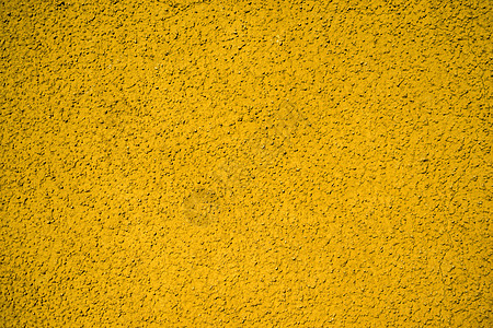 带棕色涂层的混凝土墙壁服饰房子工艺毛孔石膏房间劳动黄色图片