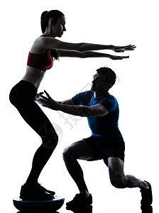女教练 男教练 女教练 在波苏上蹲着阴影训练器成年人男性平衡私人培训师运动员有氧运动健美图片