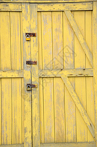 旧黄色木门住宅框架入口松树木材房子出口建筑木工网关图片