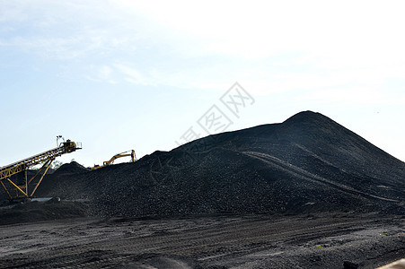 煤炭沙丘车轮矿物岩石企业天空矿石机械财富力量石头图片